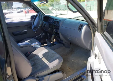 1999 Toyota Tacoma from USA, damaged, VIN 4TAPM62N8XZ407984